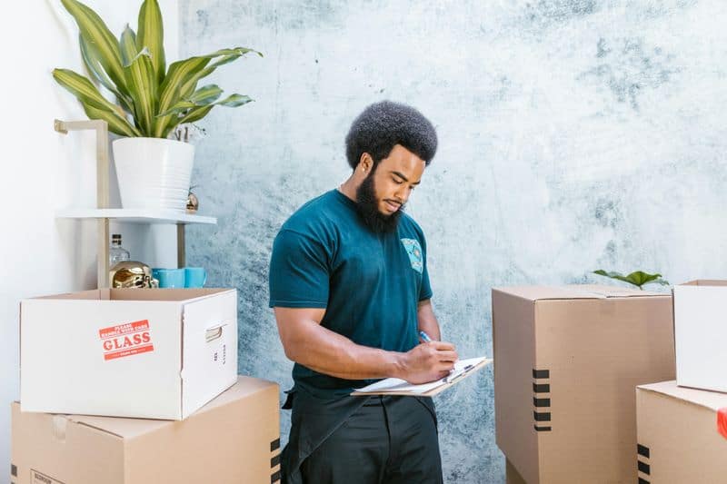 Hire a Professional (Or At Least Pretend You Can Lift That Couch)