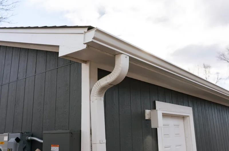 Replace Gutters and Downspouts