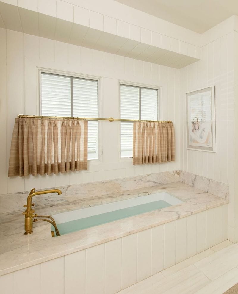 Stone-Tiled Bathtub Surround