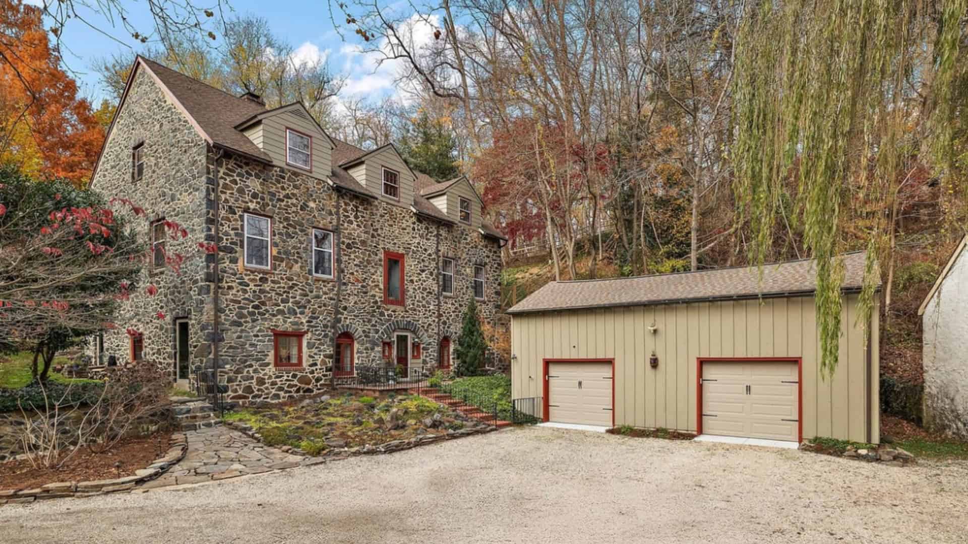 Tour This Whimsical 1800s Stone Barn With 2 Garages & Over 3,900 Sq Ft Of Luxurious Living